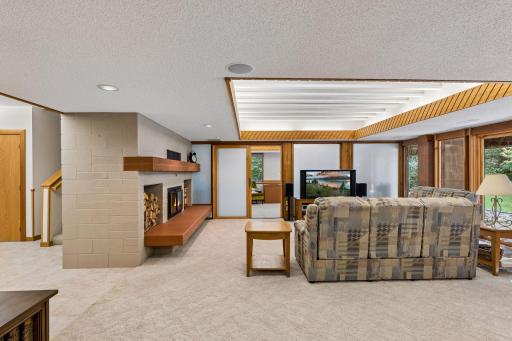Sliding glass door off the Family Room leads to the lower-level bedroom with its own bathroom