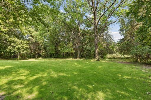 Yard leading directly to the 14th fairway and green, and the 15th tee boxes