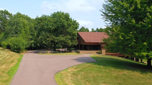 Large outdoor parking spaces, garage, and workshop aprons
