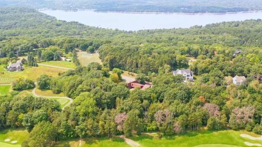 Overhead view of property with golf course on the one side and the St. Croix River off in the distance