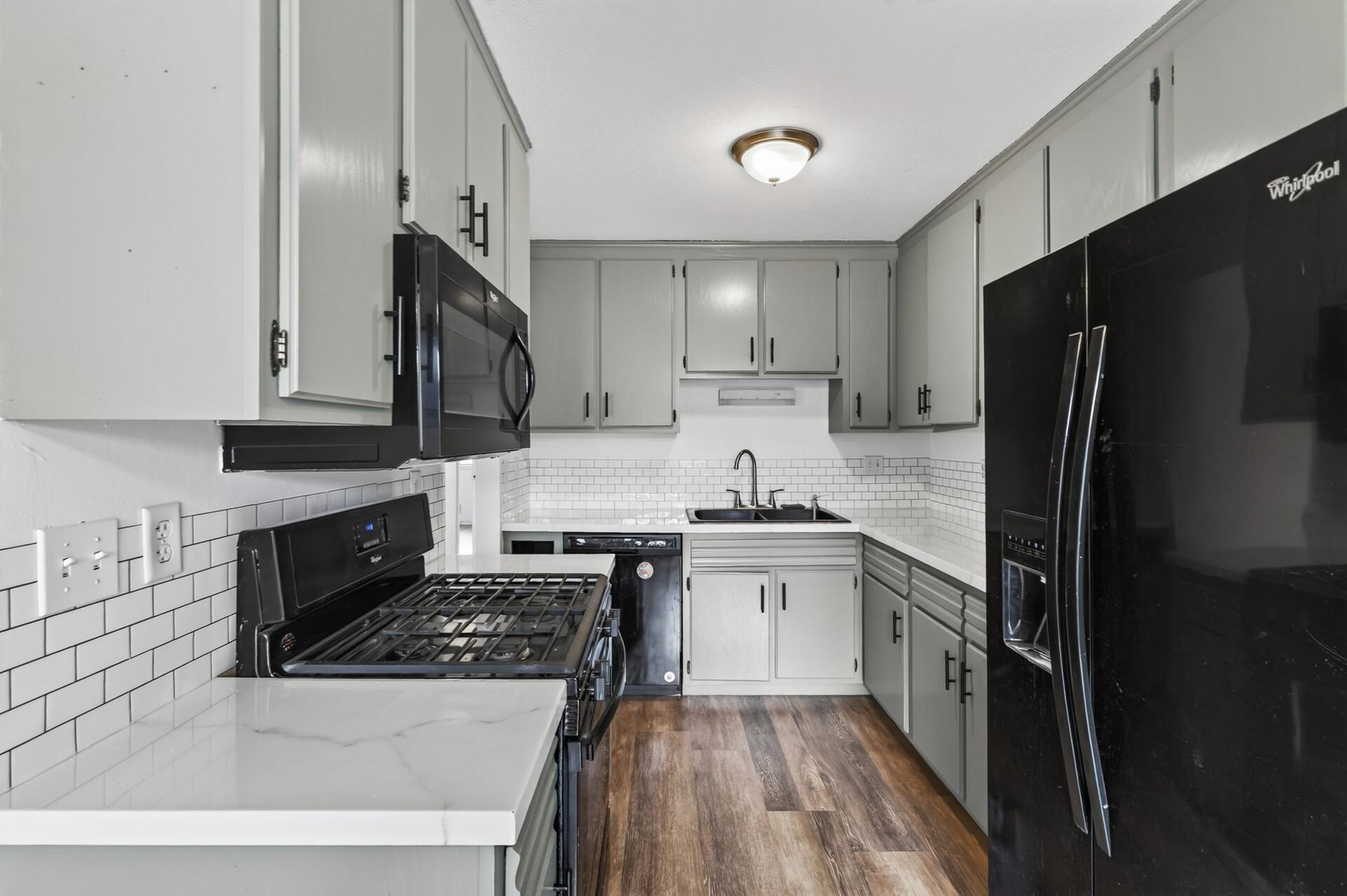 Kitchen with great counterspace and plenty of cabinets for storage.
