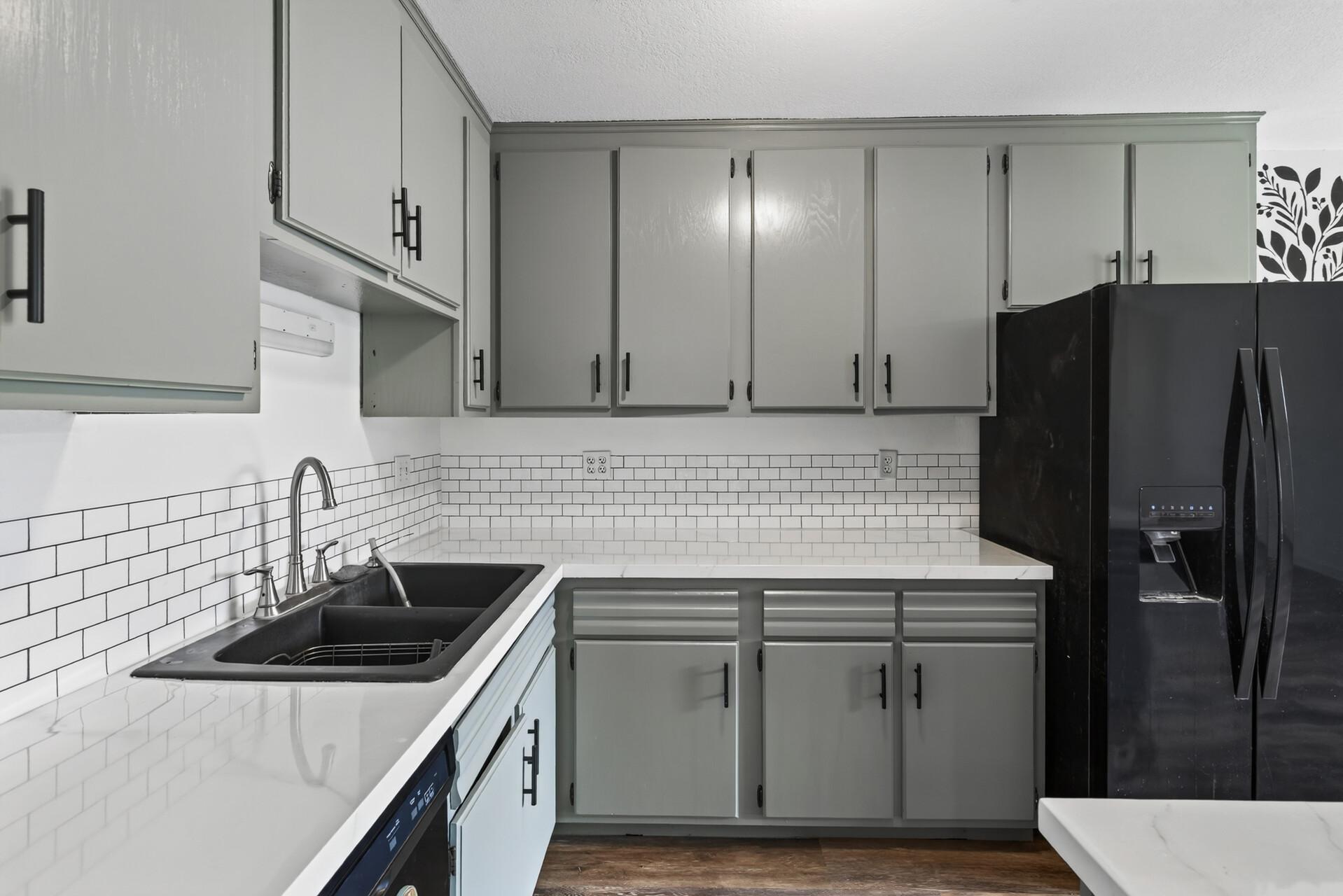 Cabinetry sporting fresh paint and updated hardware.