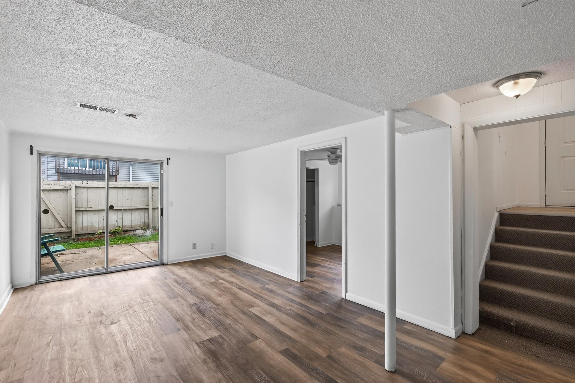Family room with walkout, offering plenty of space for both indoor and outdoor activity