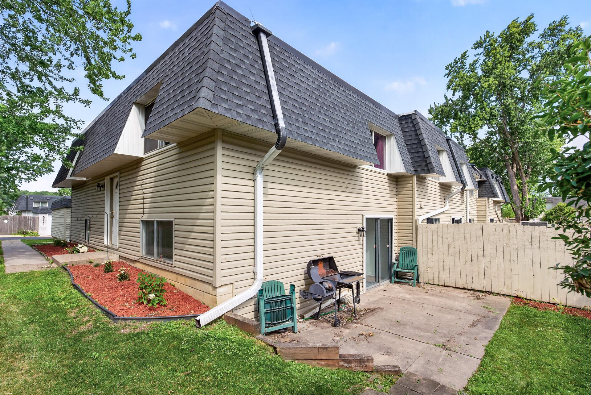 Walkout patio with privacy fence, offering plenty of opportunity for hosting friends and family to enjoy beautiful MN weather.