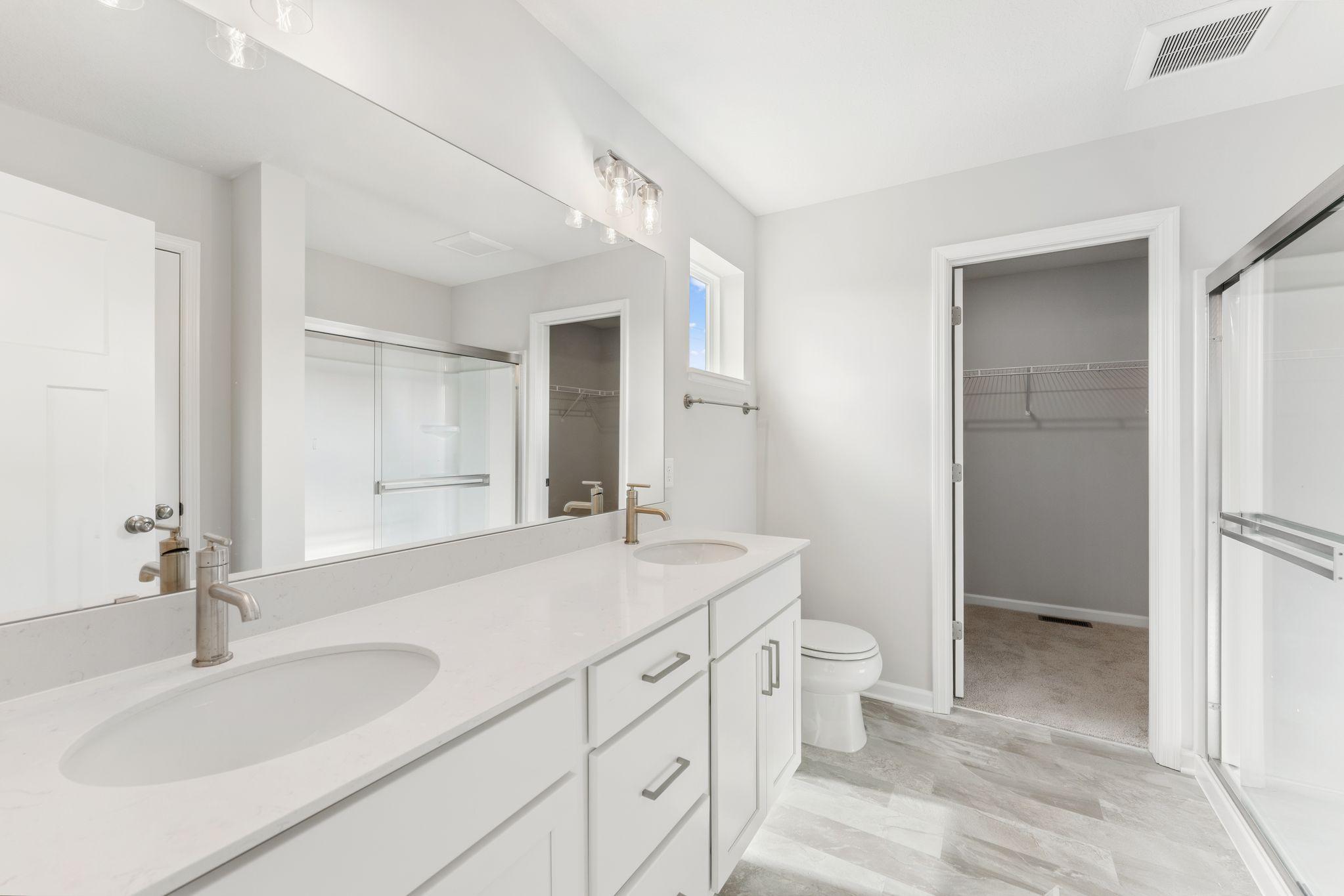 Get ready for your day in your own private bathroom. (Photos are for representation only, colors and materials may vary in actual home.)
