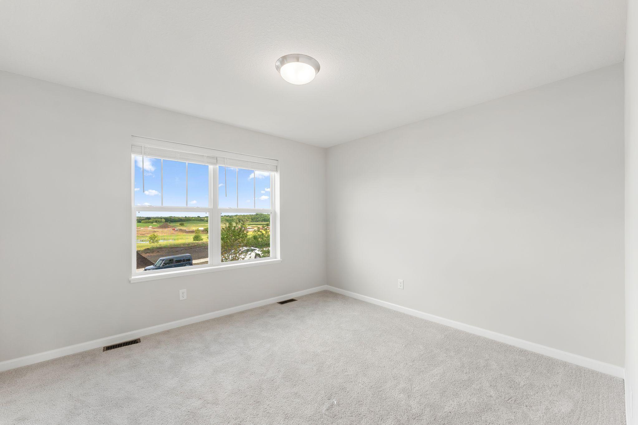 3rd of the 3 additional bedrooms. (Photos are for representation only, colors and materials may vary in actual home.)