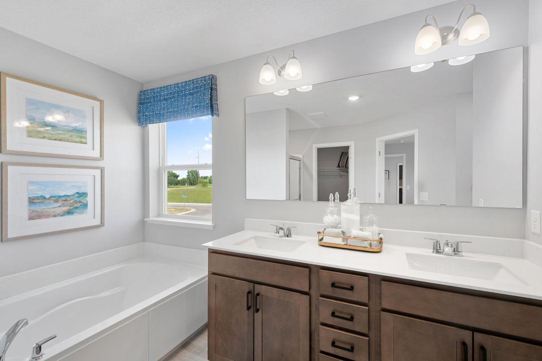 Luxurious is what you deserve. And the Jordan's primary bath delivers! Including 2 walk-in closets! Model photo, options and colors may vary.
