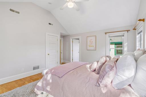 Peaceful bedroom retreat featuring layered textiles and a soft neutral palette.