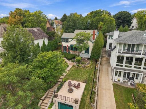 House, yard, patios, porchesâthis view pulls the whole property together.