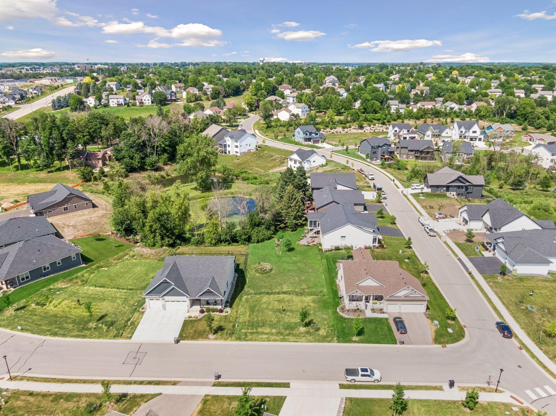 Exceptional lookout site with pond view surrounded by other custom homes.
