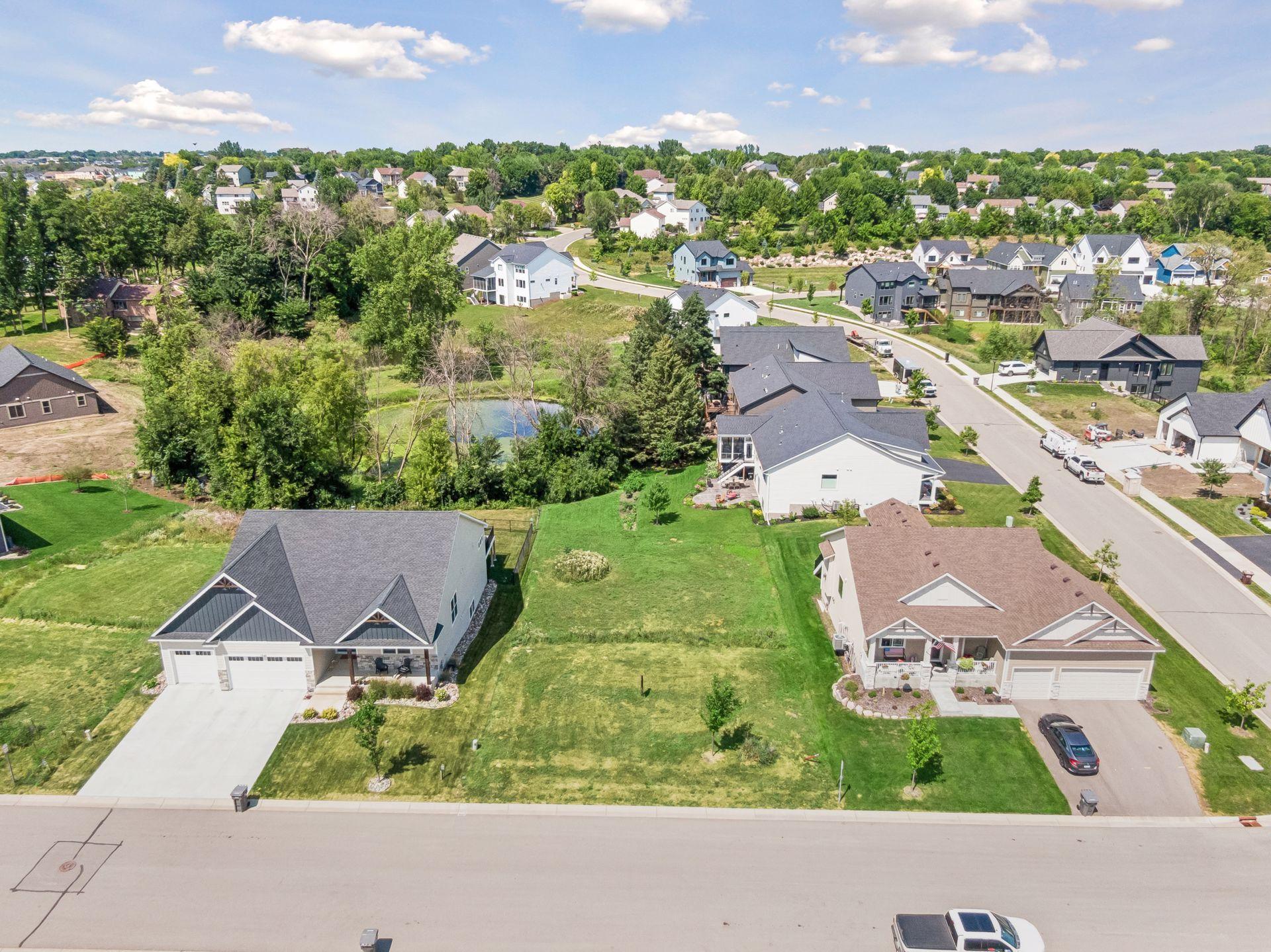 Beautiful pond view lot in Woodland Creek. Come build your dream home with endless possibilities working with Hoxie Homes!