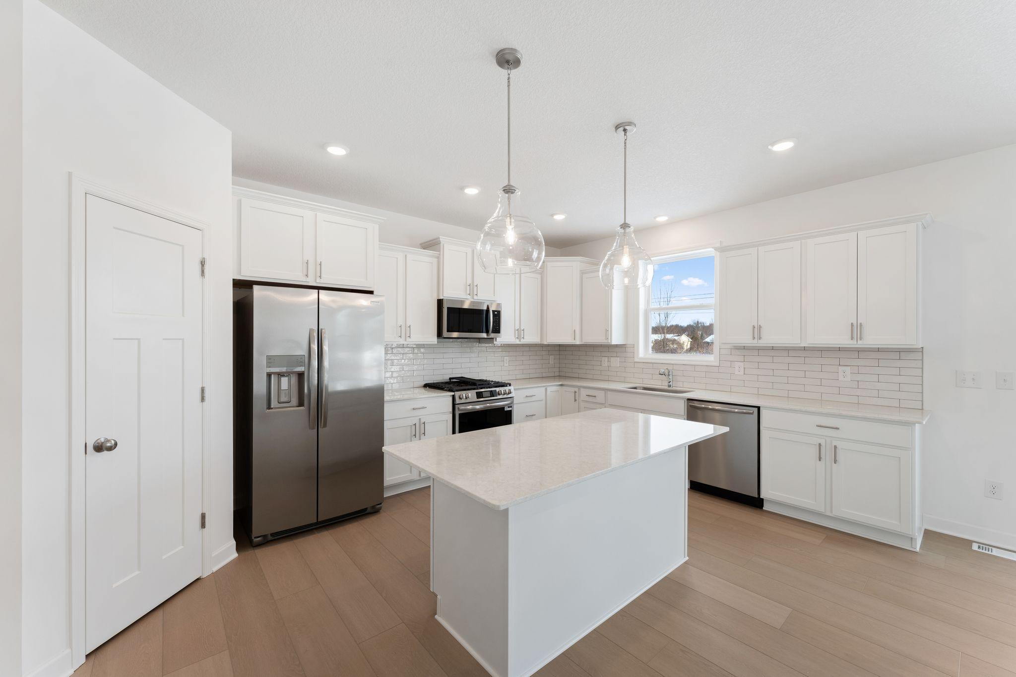 (All the following photos are of a similar home, actual finishes may vary.)