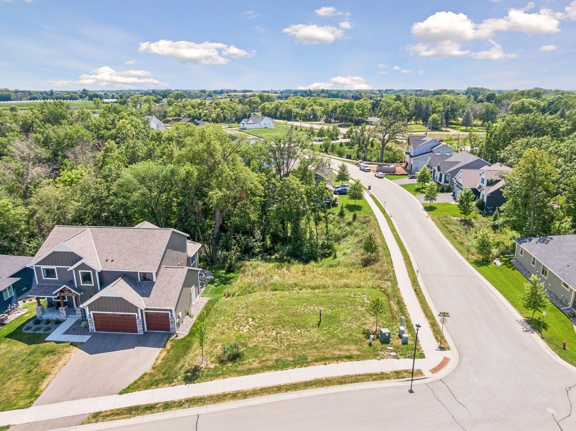 Build to suit with Hoxie Homes, Exceptional Corner Walkout Lot