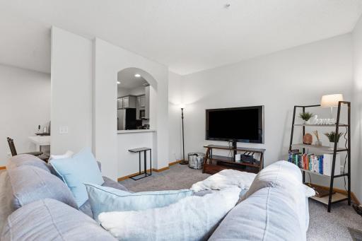 Gracious great room with TALL ceilings and open layout awaits....
