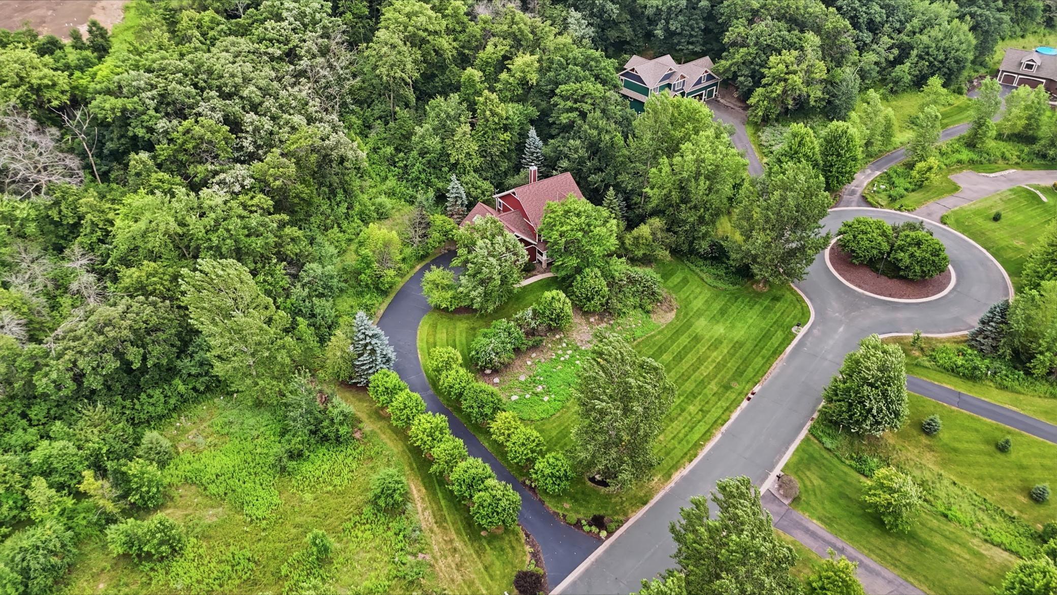 Tucked away on 2.8 private, wooded acres, this exceptional 5 bed, 4 bath home offers over 4,000 sq ft of refined living with standout craftsmanship throughout.
