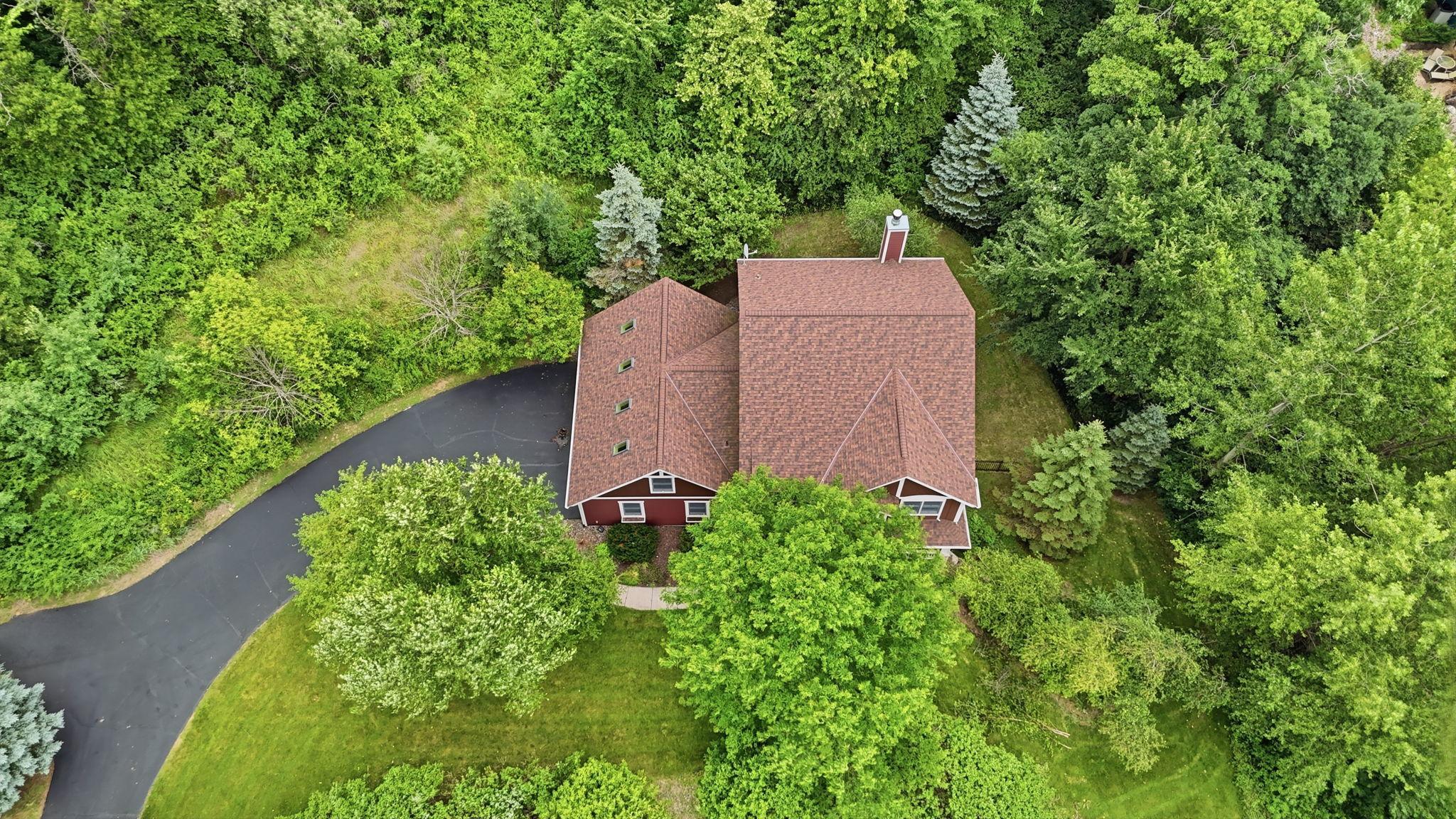 Tucked away on 2.8 private, wooded acres, this exceptional 5 bed, 4 bath home offers over 4,000 sq ft of refined living with standout craftsmanship throughout.