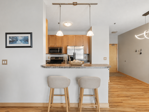 Built in breakfast bar. Barstools vitually staged.