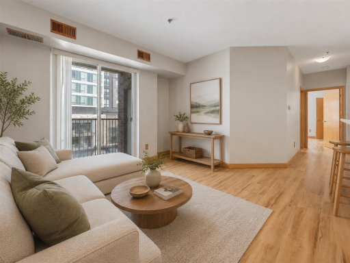 Great open layout that makes sense. The kitchen and bar are just to the right. Virtually staged.