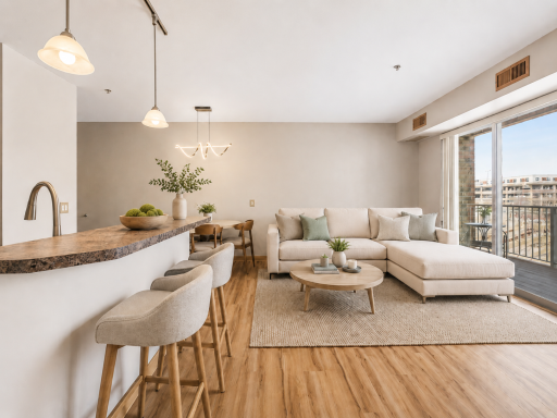 Spacious open kitchen to living/dining room. Lots of natural light comes in from your private patio. Virtually staged.