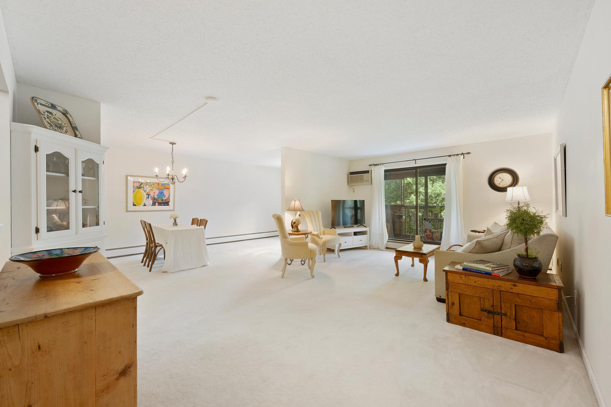 Open floor plan and move-in ready. Note the 3-season porch directly off the living room.