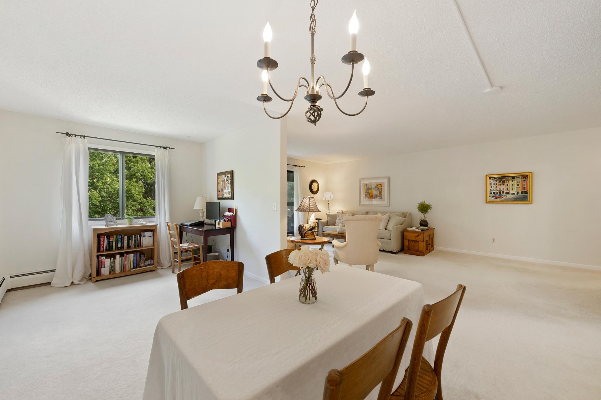 Living room flows right into the "bonus" room. The sky's the limit on how you design and use all this space!
