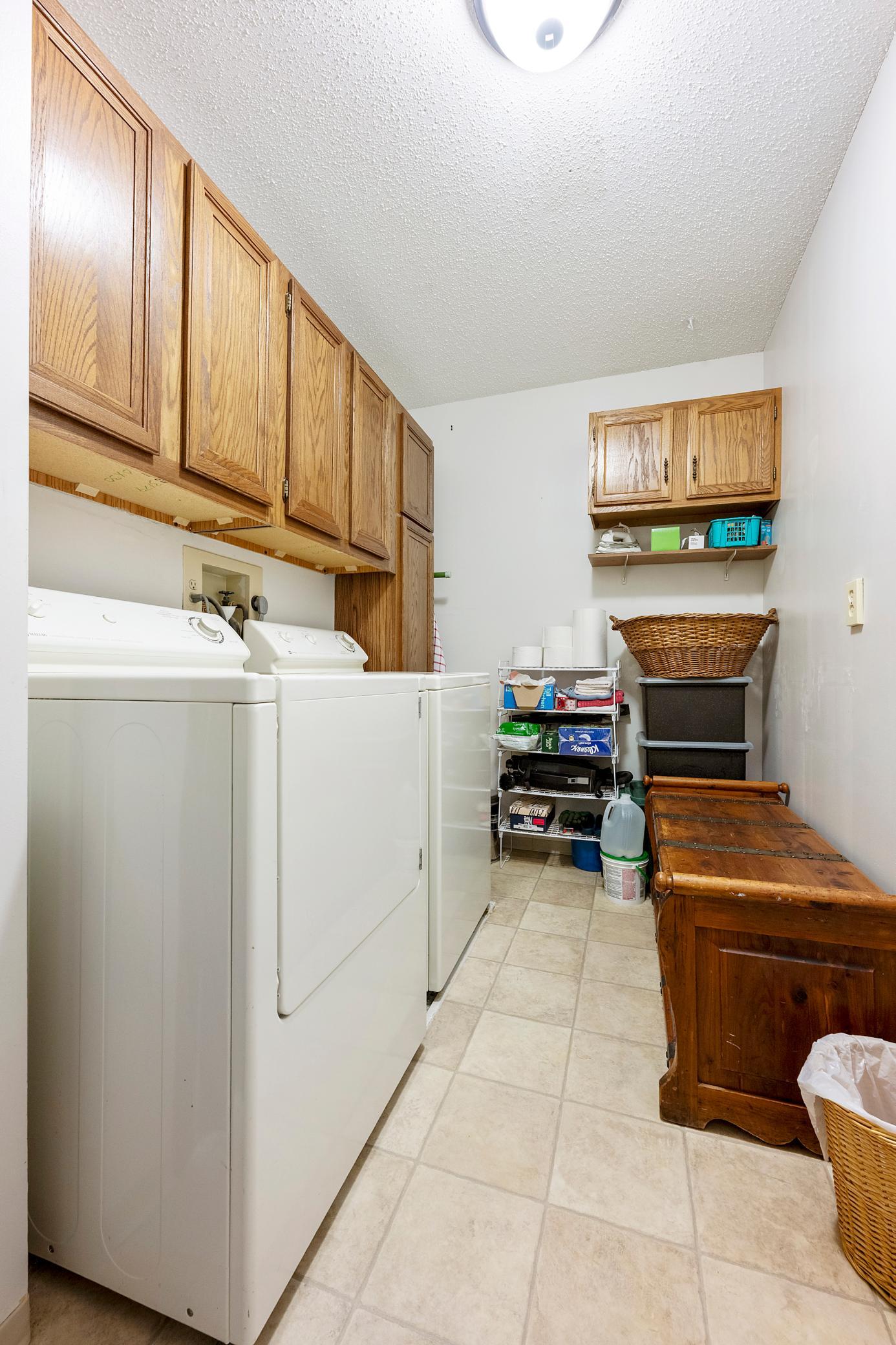 Having your own laundry room within your condo is very useful. Having all the addition cabinets for storage is especially a bonus! Large enough for this full size washer/dryer pair and floor space to spare for clothes baskets.