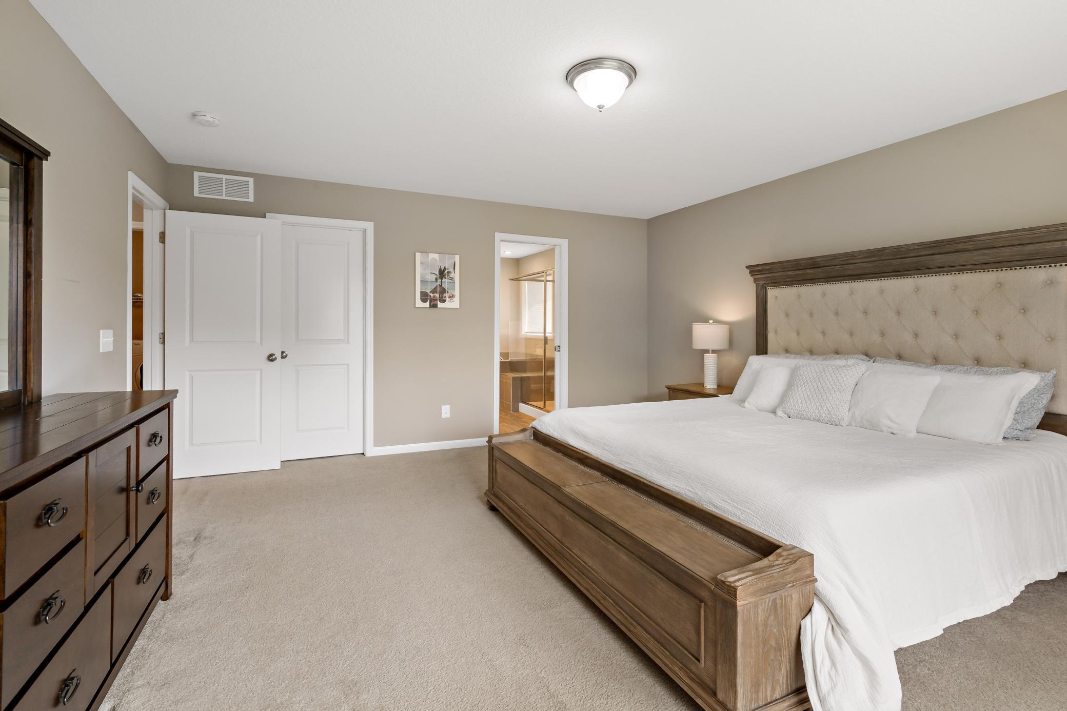 Primary bedroom boasts private 4 piece bath and huge walk in closet.