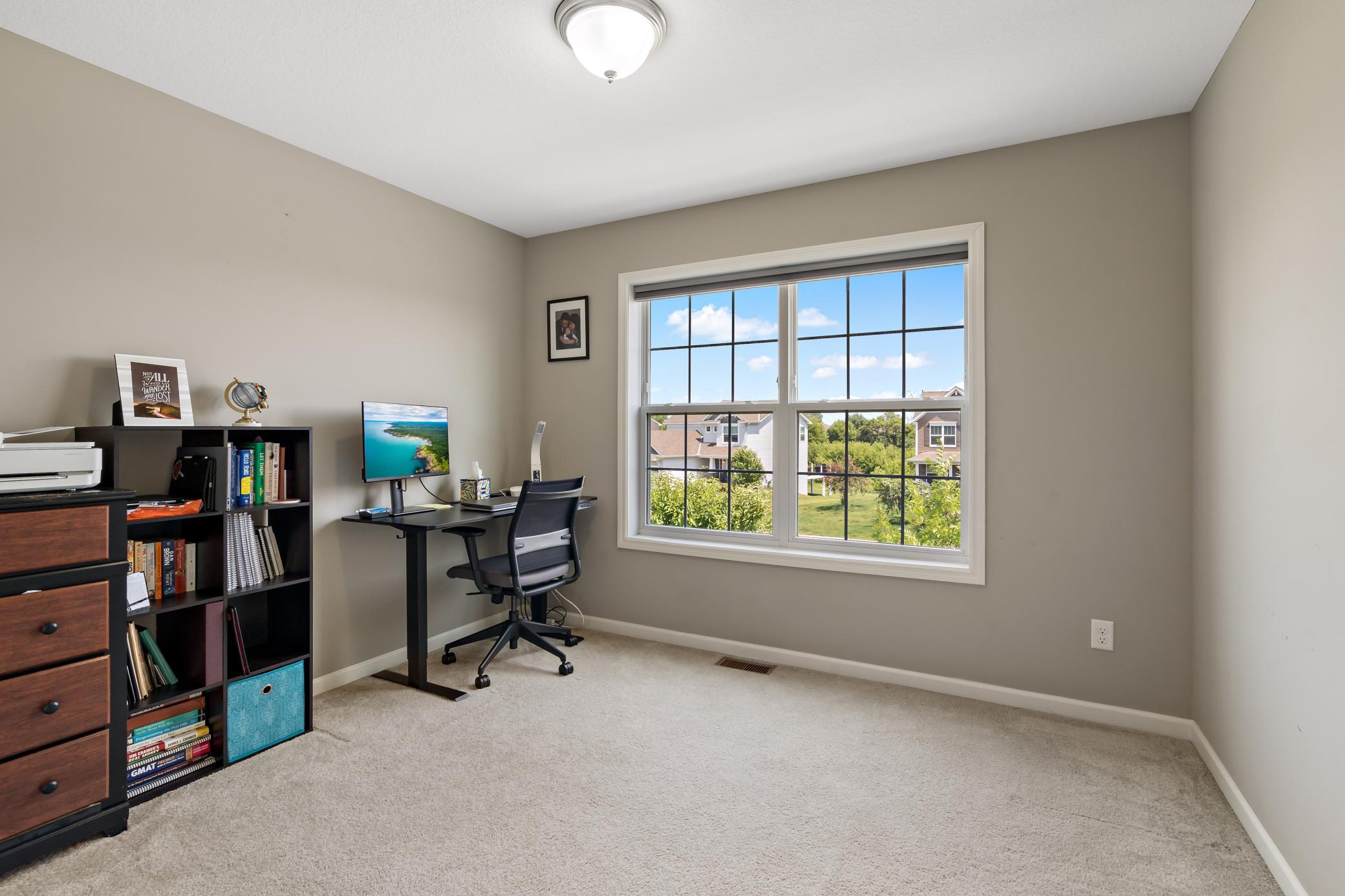 Bedroom #4 is currently being used as a home office