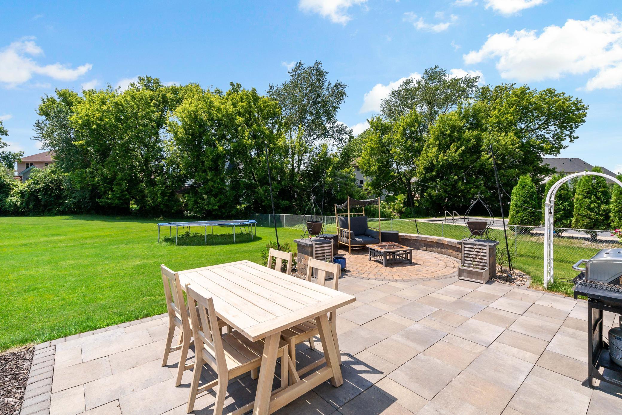 Stunning patio and firepit area is a MUST SEE!