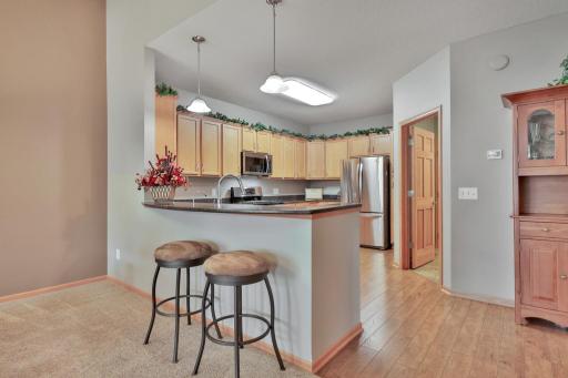 Eat up peninsula. Upgraded plank flooring, solid wood doors throughout.
