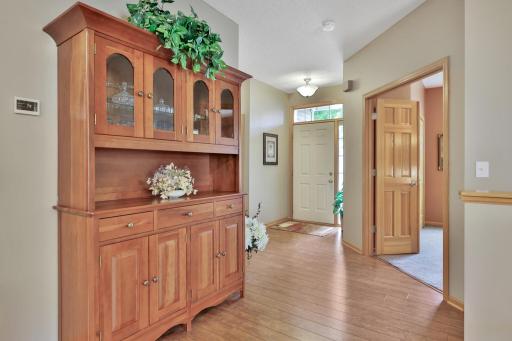 Spacious foyer with side light and transom entry door.