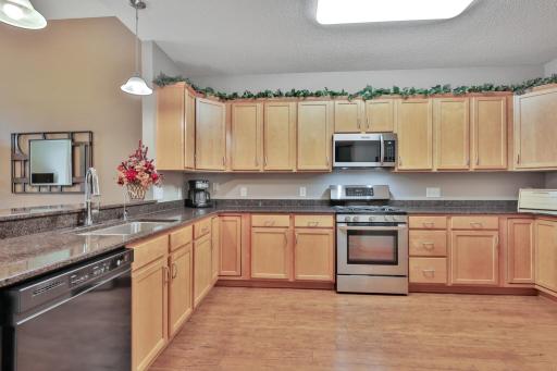 Cambria counter tops, and an abundance of cupboard and counter top working space.