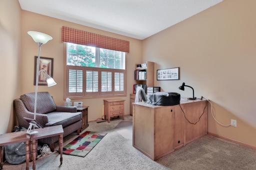 One of the 3 main floor bedrooms used as an office.