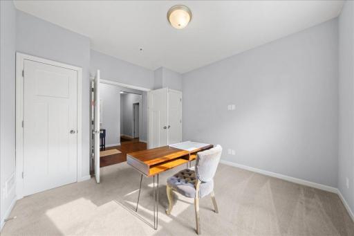Main level office with french doors which can also serve as a bedroom
