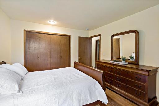 2nd Bedroom featuring beautiful wood floors and generous space.