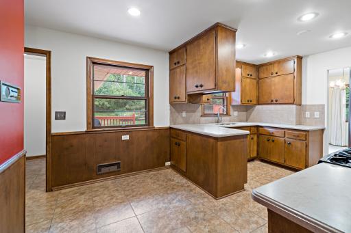 Eat-in kitchen featuring stainless steel appliances and a comfortable dining area, perfect for casual meals and everyday living.