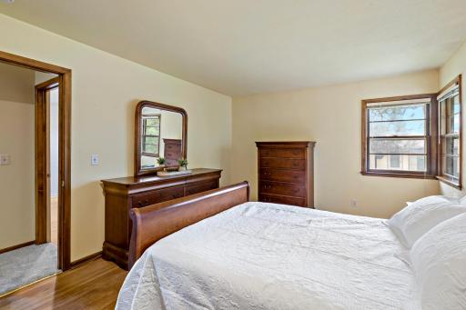 2nd Bedroom featuring beautiful wood floors and generous space.