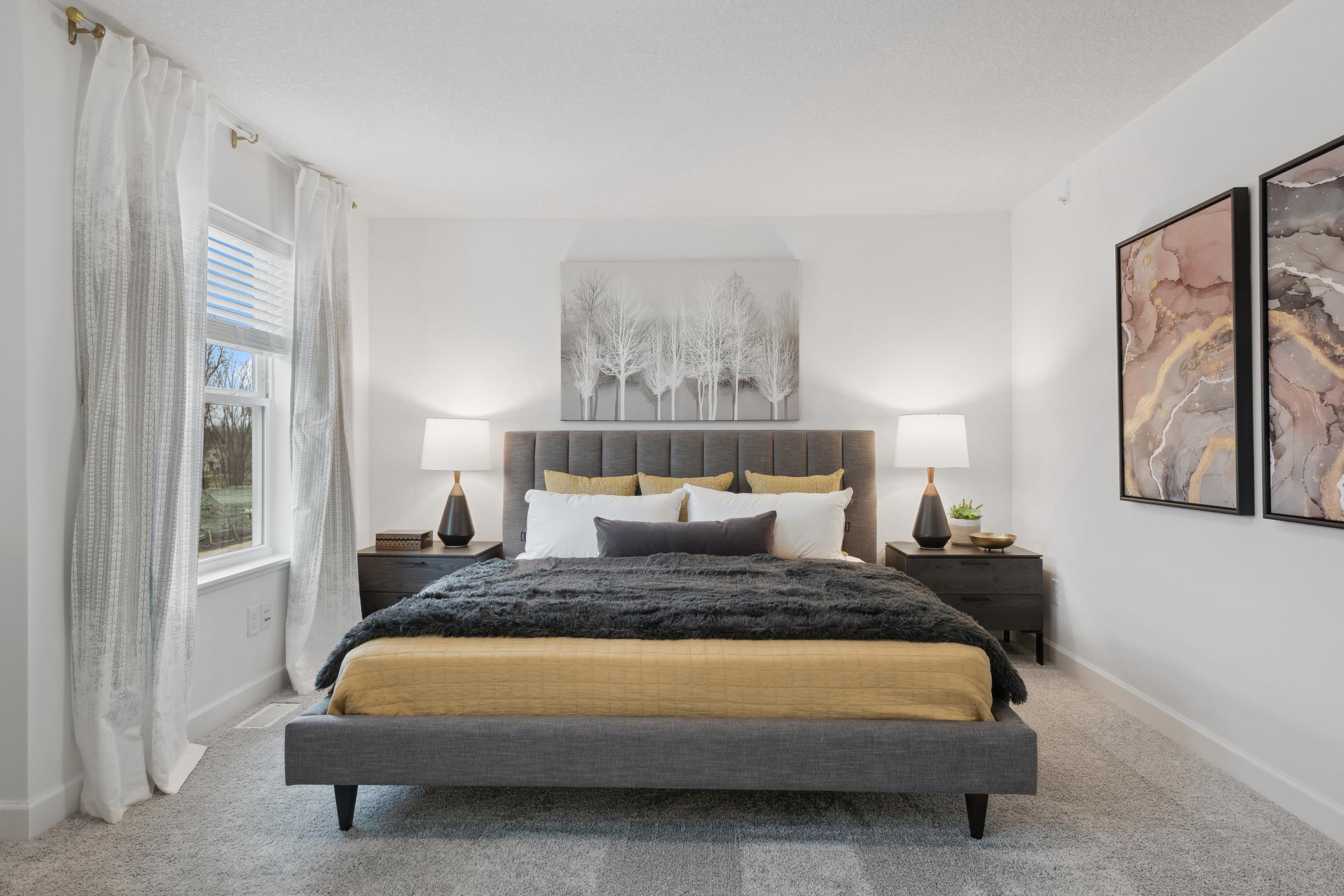 (Photo of decorated model, actual home's finishes vary) Find your retreat in this stunning owner's suite. Enjoy the exclusivity of a private bath and huge walk-in closet.