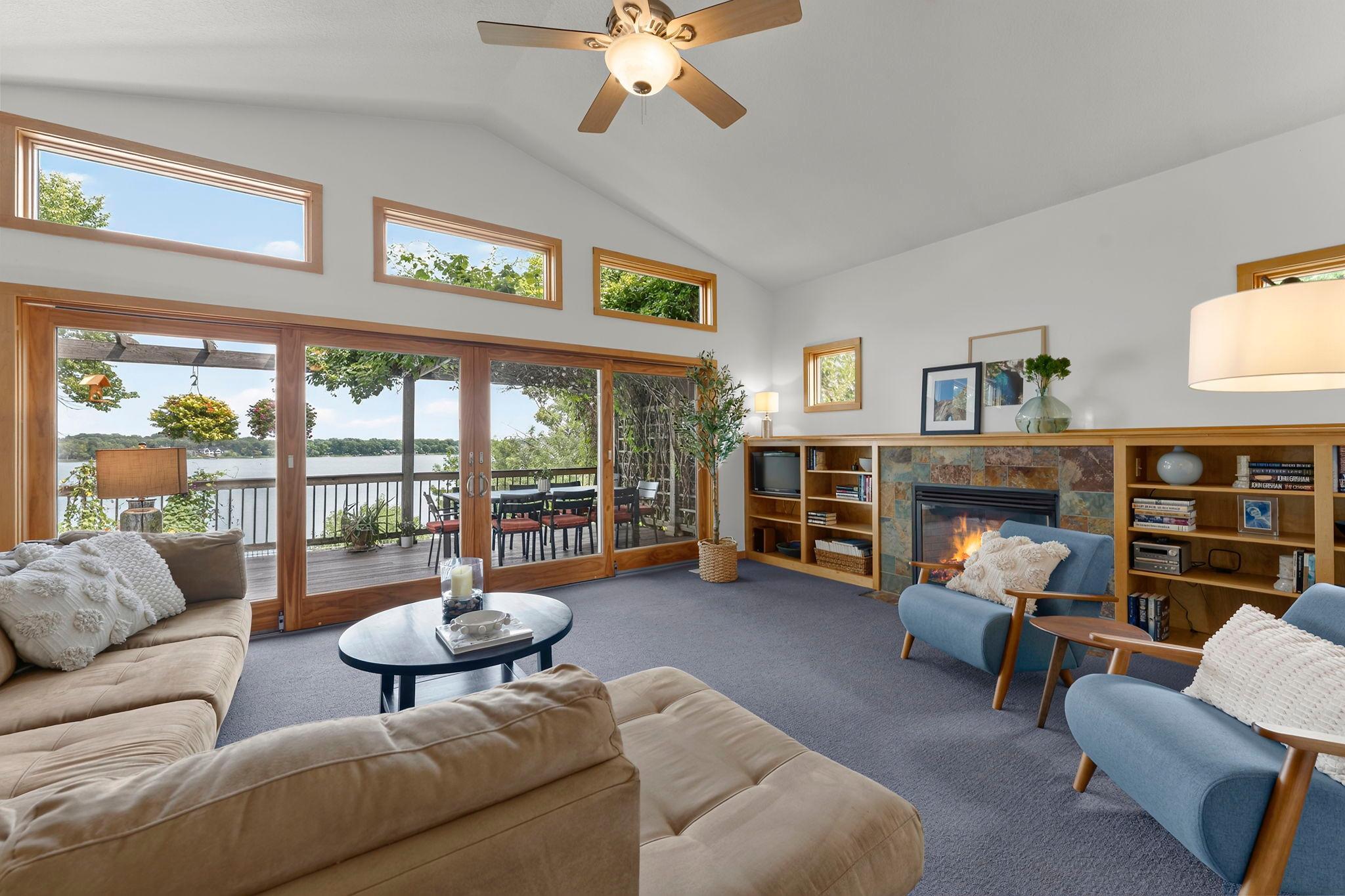 Great room with large windows and fireplace.jpg