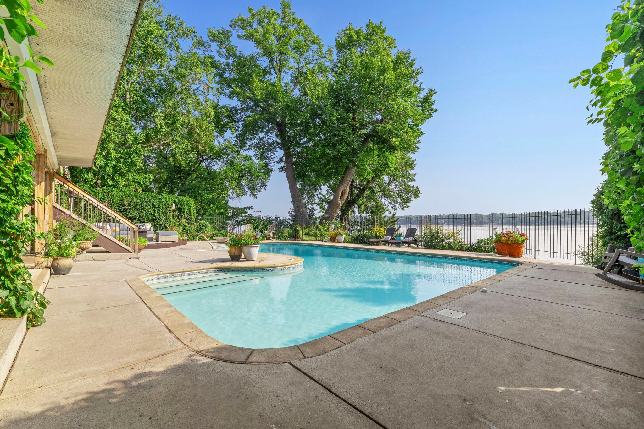 Relaxing pool area overlooks the lake.jpg