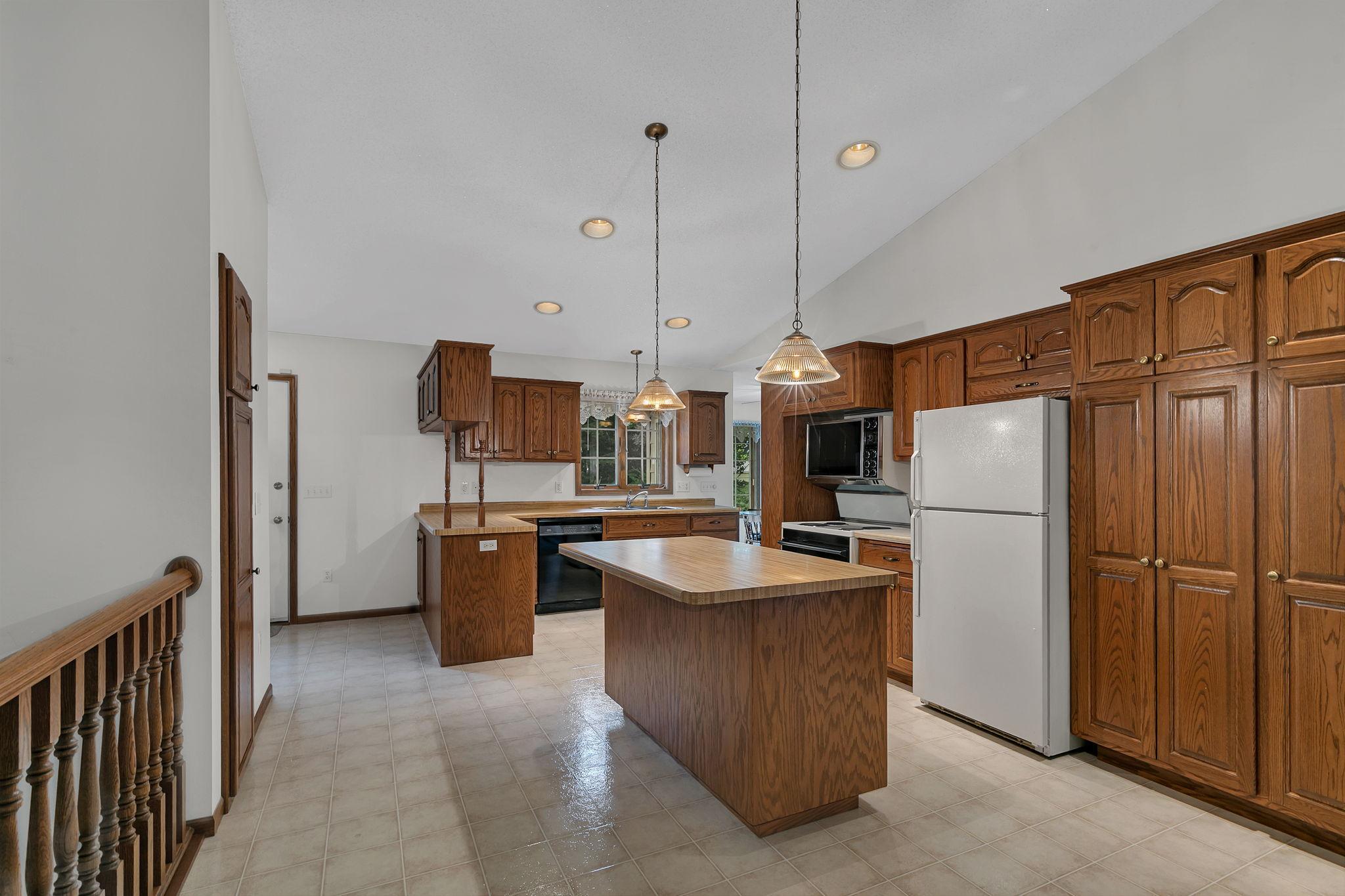 Massive Kitchen with Plenty of Cabinets and Slide Outs