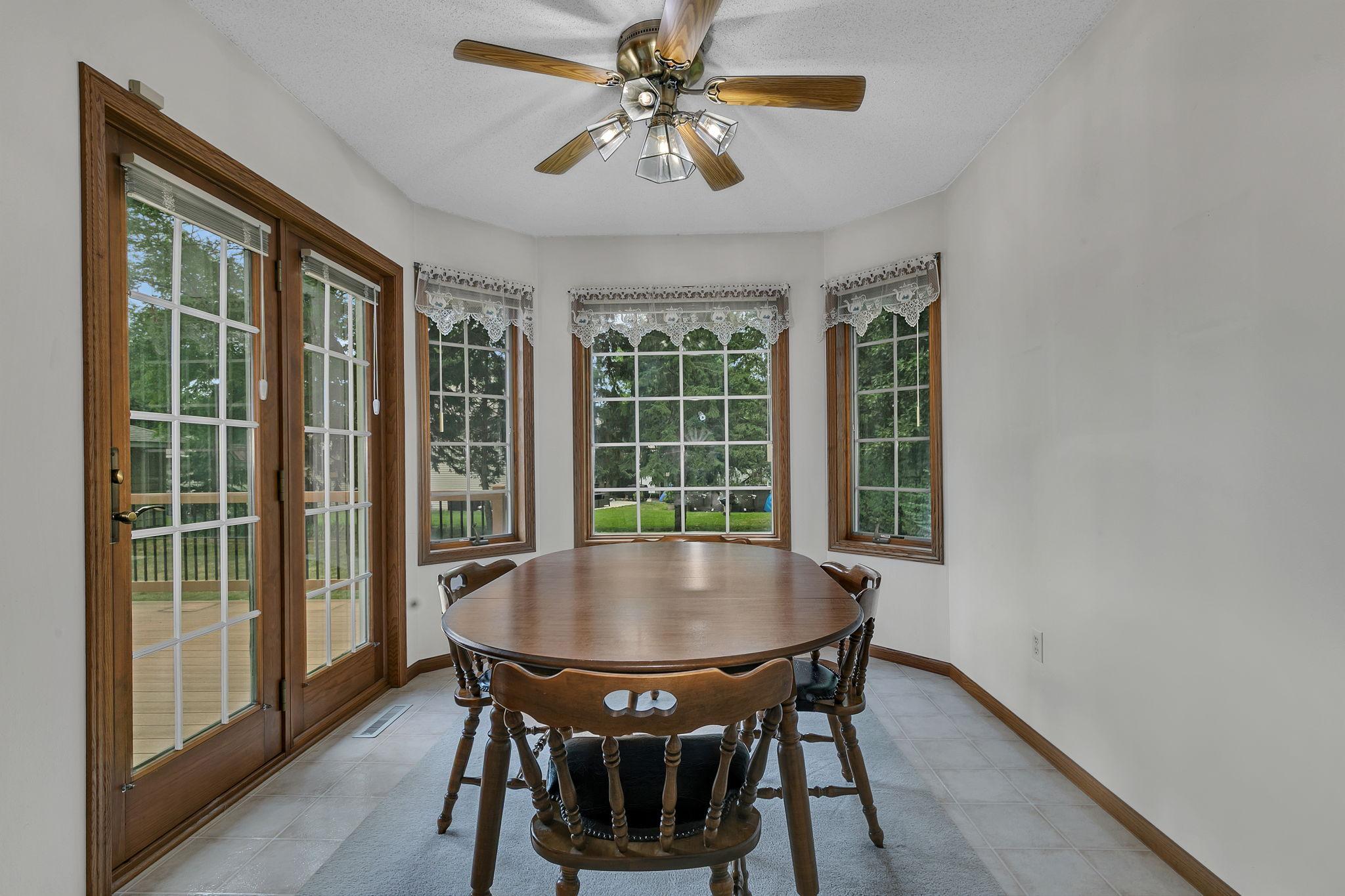 Dining Room with Access to the Deck and Backyard