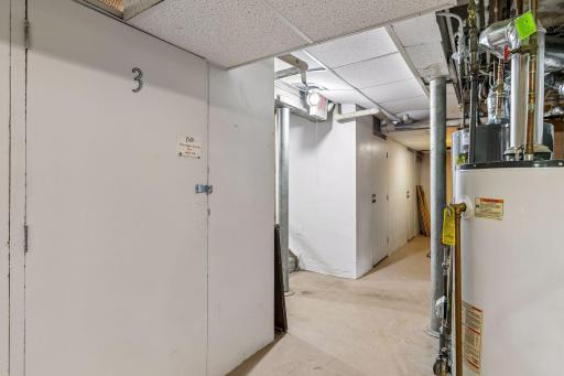 This unit comes with a storage space in the lower level. Three window air conditioners are also included in the sale. 