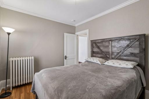 Bedroom 1 - This unit has two well-sized bedrooms, both with painted woodwork & smooth ceilings.
