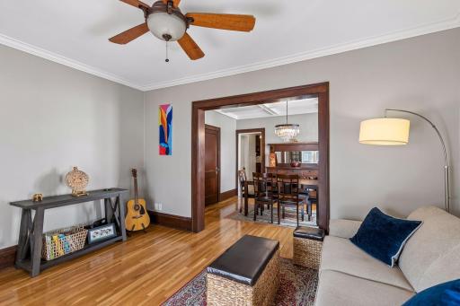 Bright and spacious 2nd floor unit with a large living room, boasting natural woodwork, crown molding & smooth ceiling.