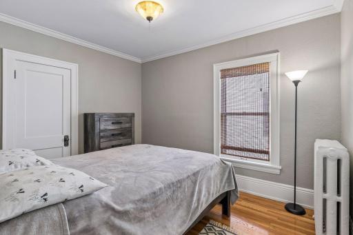 Bedroom 1 - This unit has two well-sized bedrooms, both with painted woodwork & smooth ceilings.