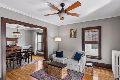 Bright and spacious 2nd floor unit with a large living room, boasting natural woodwork, crown molding & smooth ceiling.