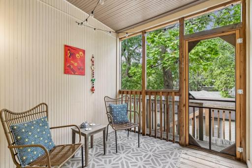 Rear door leads out to a sunny, west-facing screened porch.