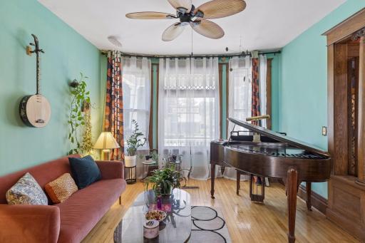 The bright living room is located to the right of the front entrance.