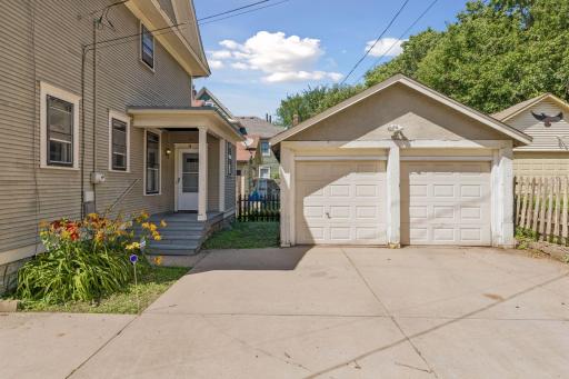 Two-car garage with a concrete driveway.